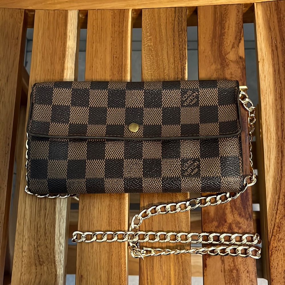 Authentic LV Damier Ebene Sarah wallet on an unbranded chain